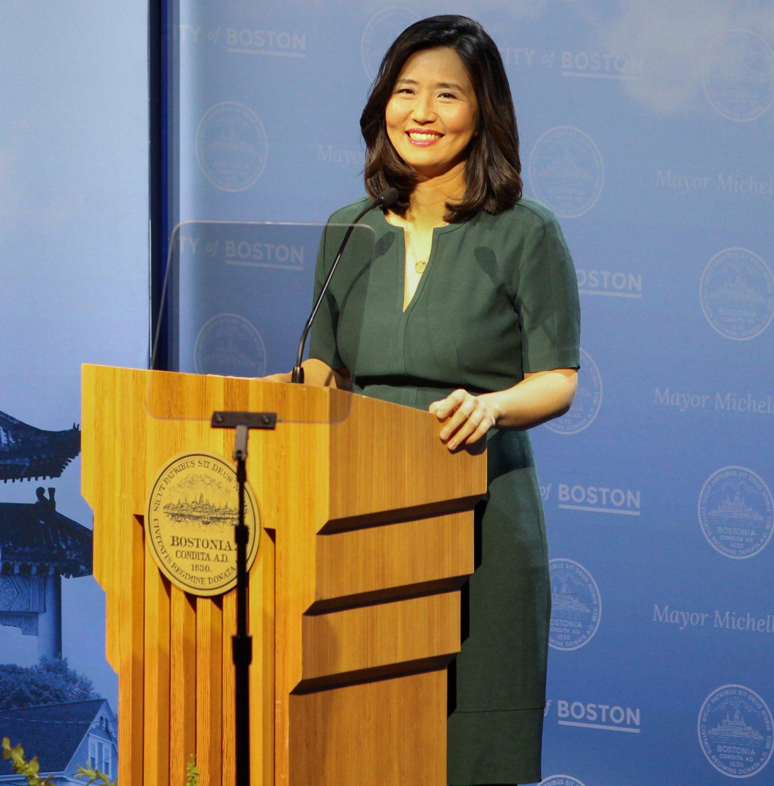 Mayor Michelle Wu smiles at the crowd before giving her city address at MGM Music Hall at Fenway March 19. Wu officially announced that she would be running for reelection at the Cyclorama Building at South End April 5. SARAH CRUZ/DFP PHOTOGRAPHER