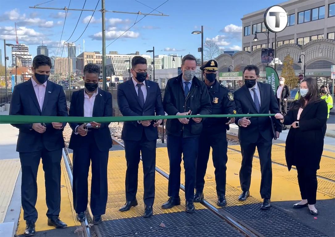 MBTA officials cut a ceremonial ribbon Tuesday at the newly constructed Amory Street Green Line stop. Two new Green Line stops opened on Commonwealth Avenue Monday after nine months of construction. ZOE TSENG/ DAILY FREE PRESS STAFF
