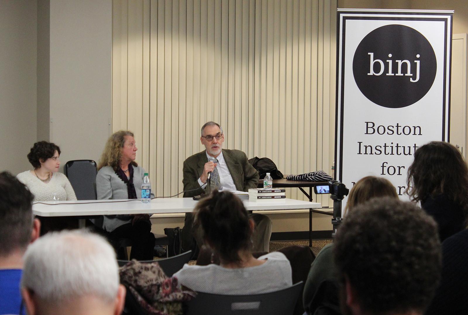 Jim Vrabel speaks with Rachel Hock, left, and Joyce Radnor during the “Behind Barry’s Corner: Panel on Allston Gentrification” panel Tuesday night. PHOTO BY RACHEL MCLEAN/DAILY FREE PRESS STAFF
 